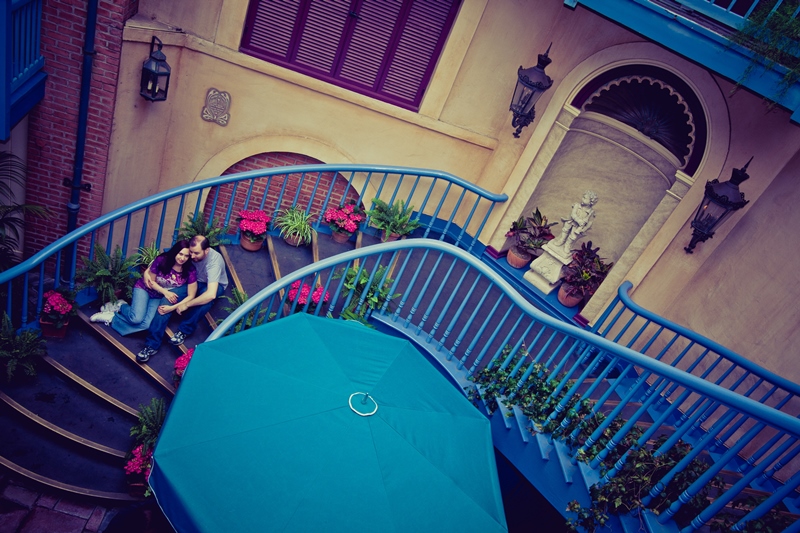 Couple sitting on stairs inside Court of Angels