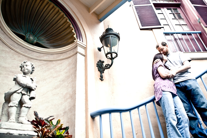 Couple standing on stairs at Court of Angels