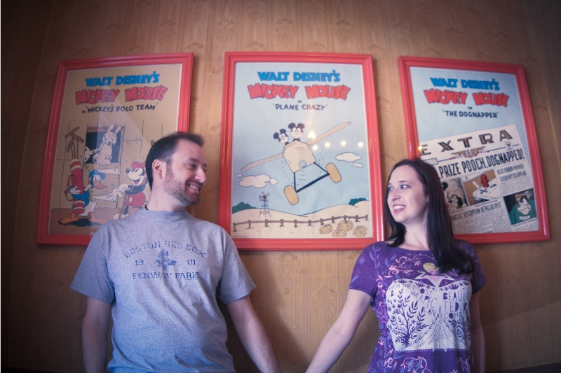 Couple posing at Disneyland Main Street Cinema