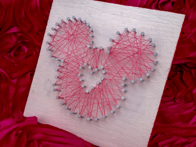 Completed string art Mickey shape with heart