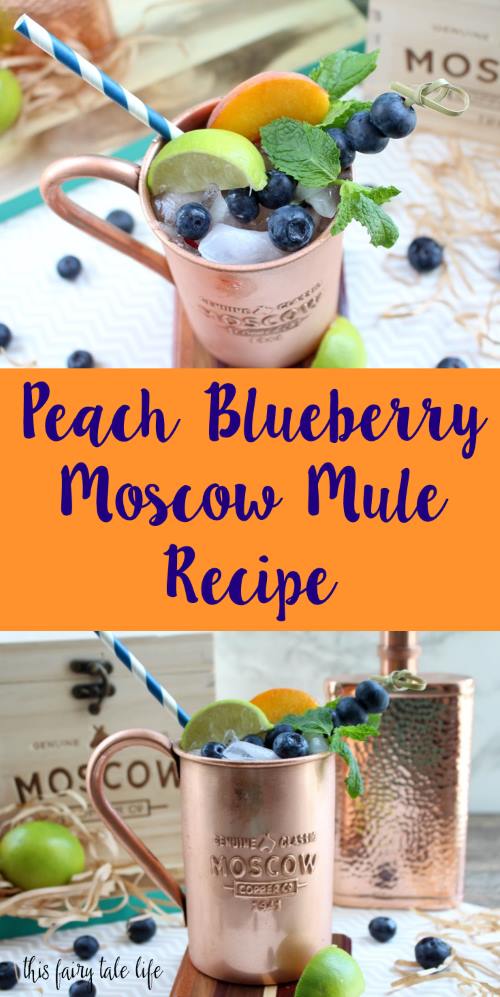 Copper mug containing Moscow Mule alcoholic drink, garnished with mint leaves, lime slices, peach slices, and blueberries, with text overlay that reads, "Peach Blueberry Moscow Mule Recipe."