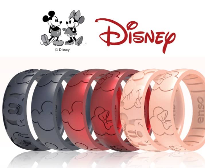 Row of six rings, 2 black 2 red, and 2 rose gold. They have subtle designs of Mickey Mouse and Minnie Mouse.