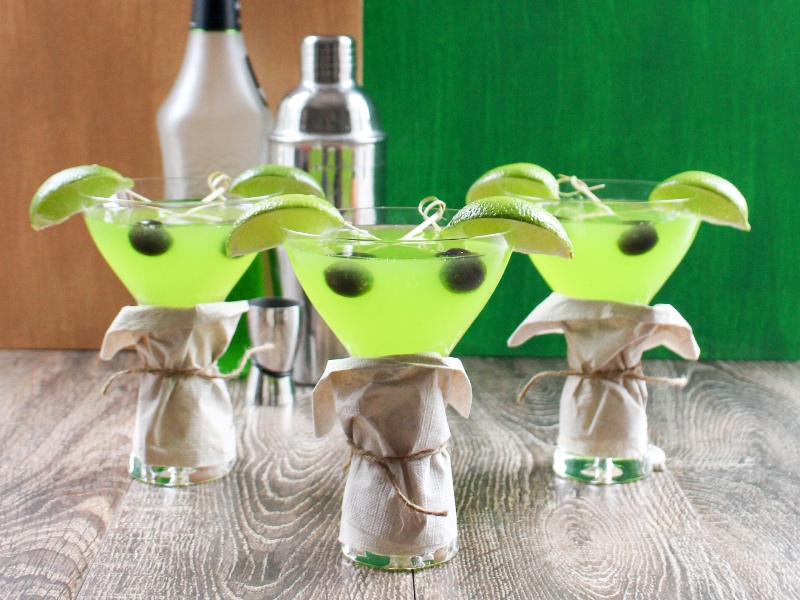 trio of baby Yoda cocktails with green and gold background