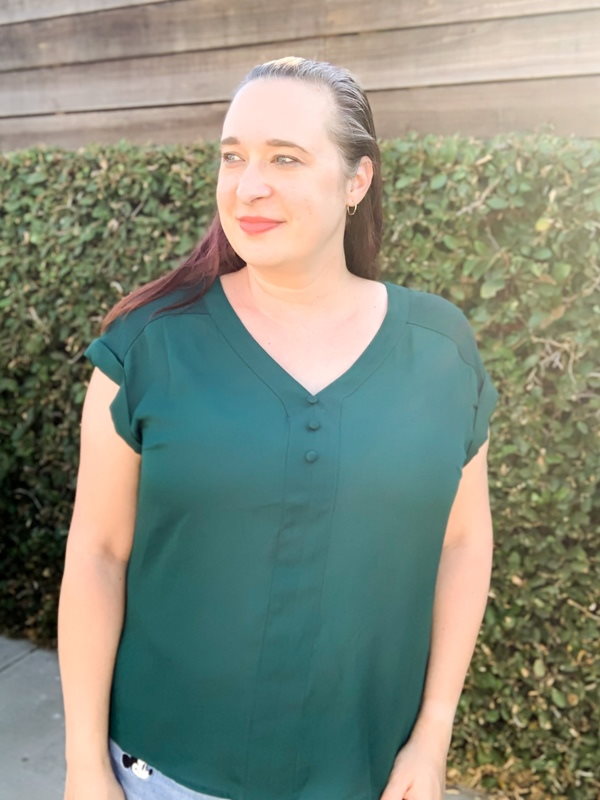 Woman wearing green top