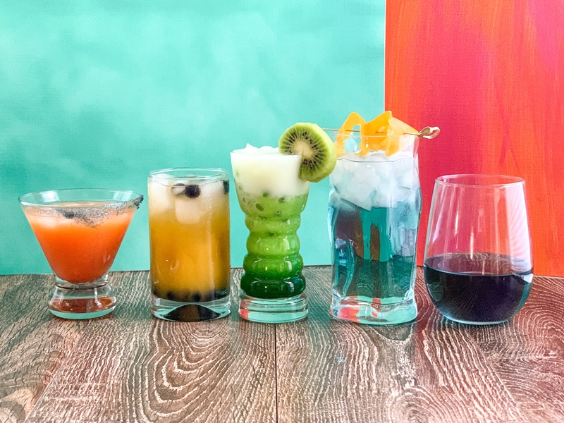 Five different color cocktails in a row