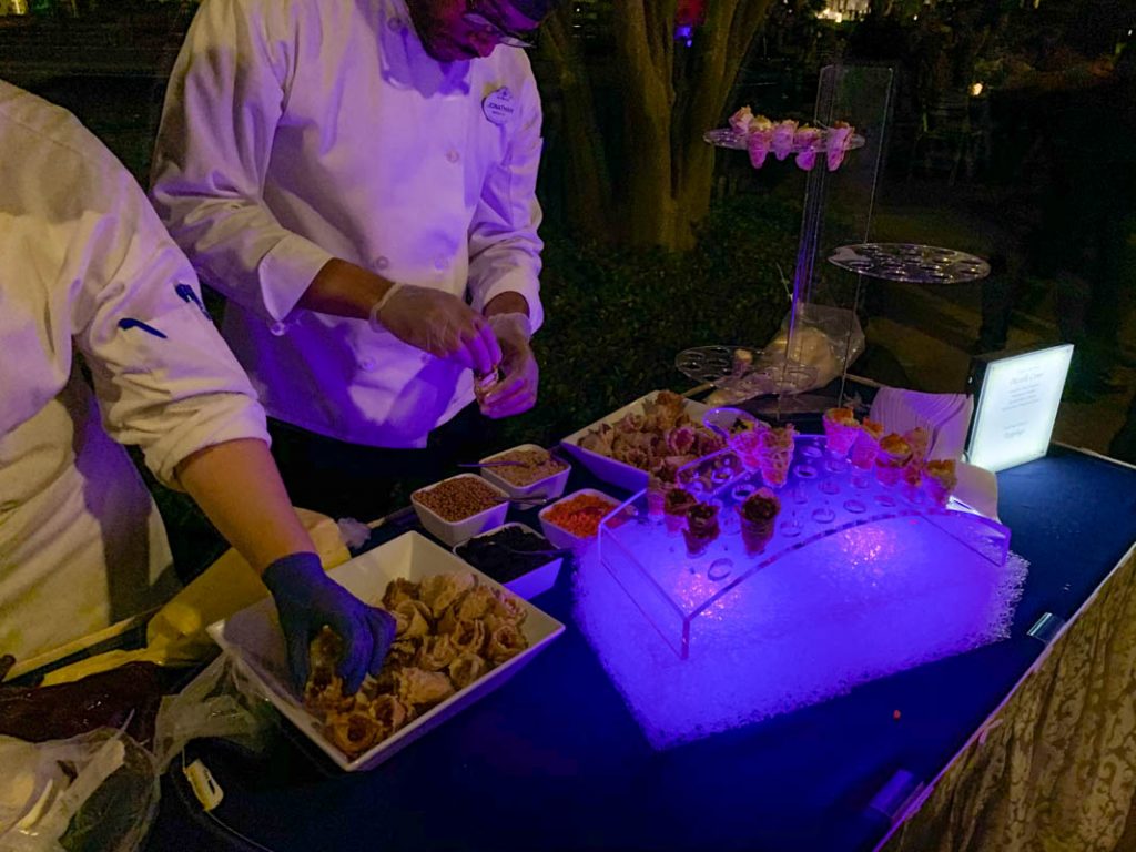 Chef creating desserts at table creating desserts at table