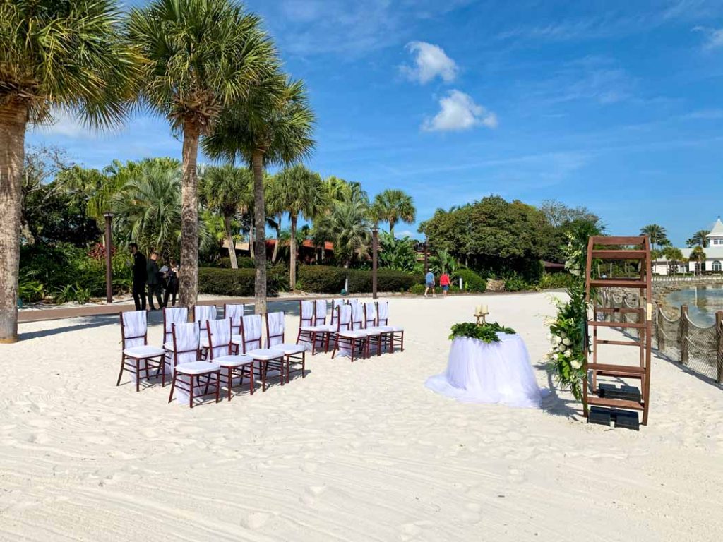 wedding ceremony at luau beach at disney's polynesian resort