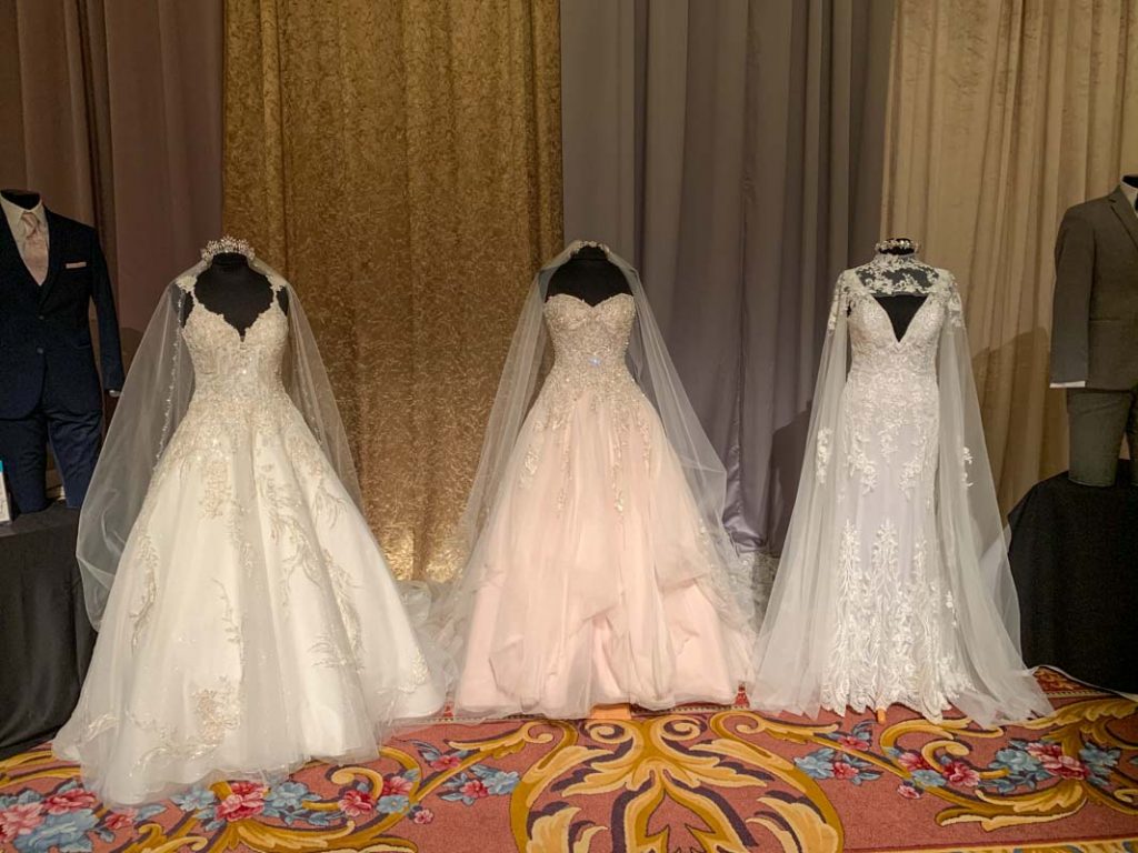 Three mannequins with bridal gowns