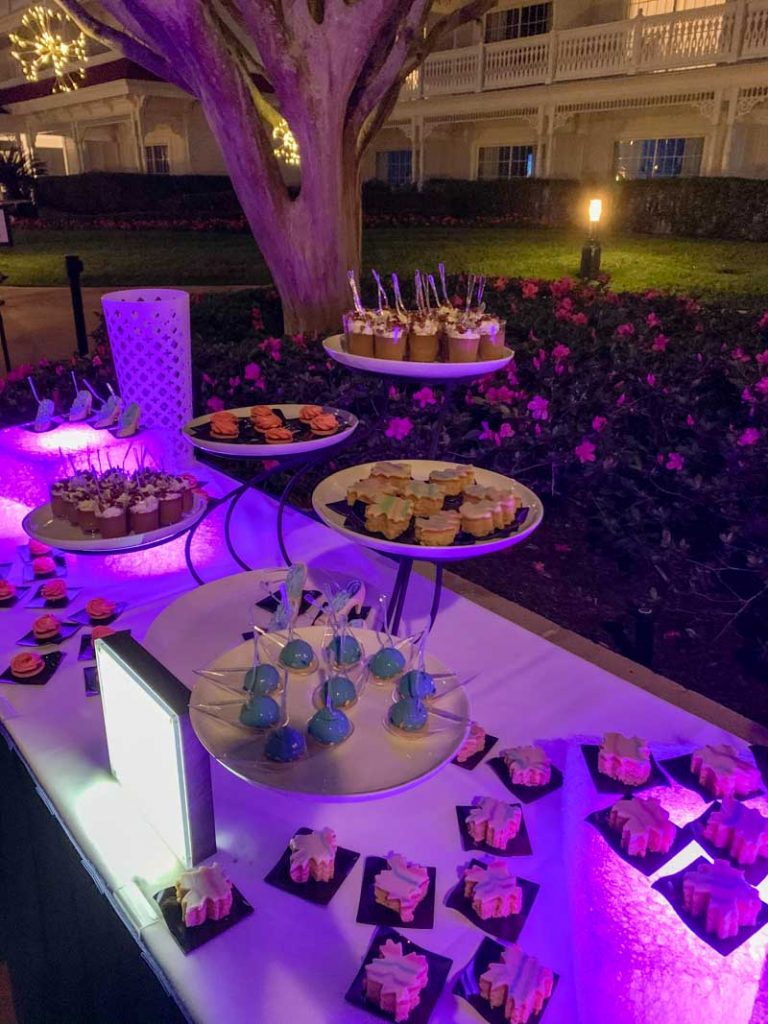 Table with various trays of dessert