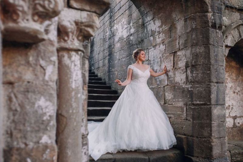 Bride wearing wedding gown inspired by Disney Princess Cinderella