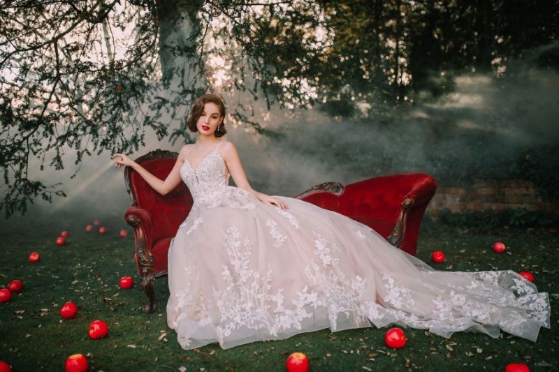 Bride wearing wedding gown inspired by Disney Princess Snow White