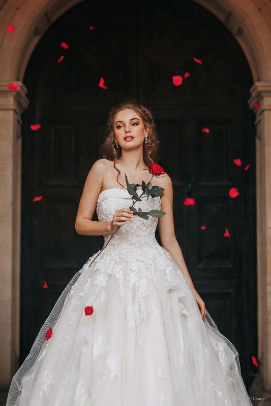 Bride wearing wedding gown inspired by Disney Princess Belle