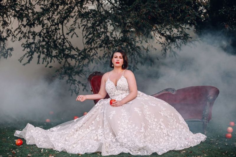 Bride wearing wedding gown inspired by Disney Princess Snow White