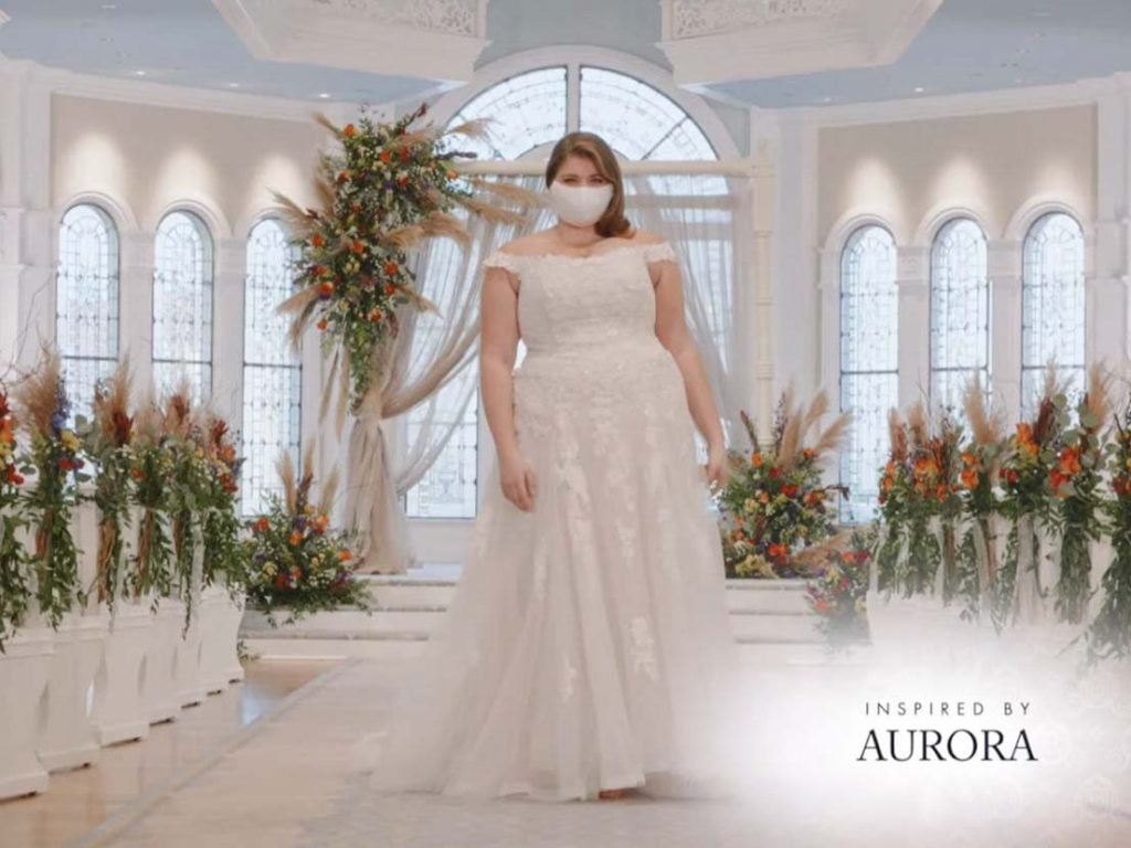 Woman wearing wedding gown inspired by Aurora