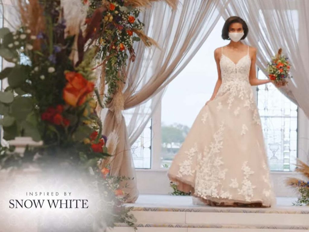 Woman wearing wedding gown inspired by Snow White