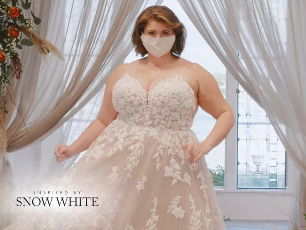 Woman wearing wedding gown inspired by Snow White