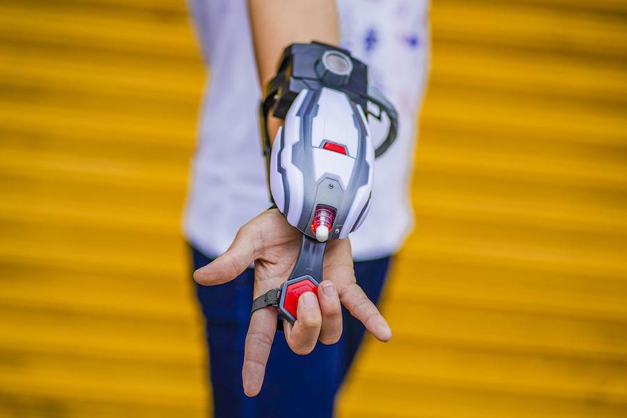 Close up of hand wearing Power Band device