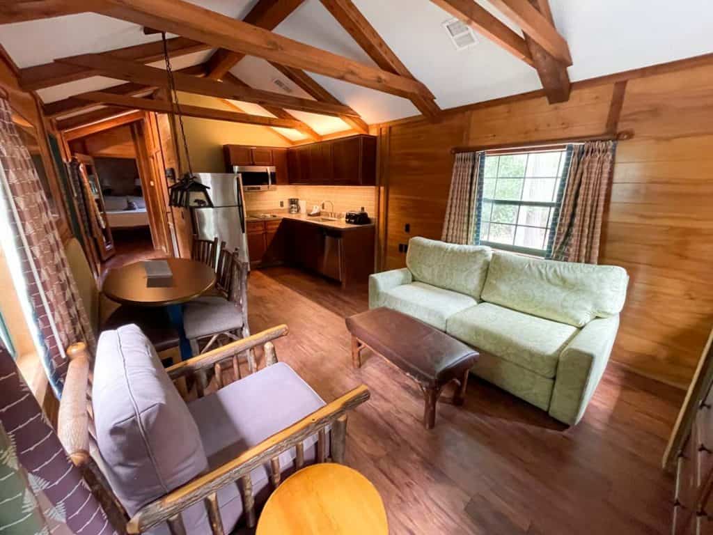 Living room and kitchen inside Fort Wilderness Cabin