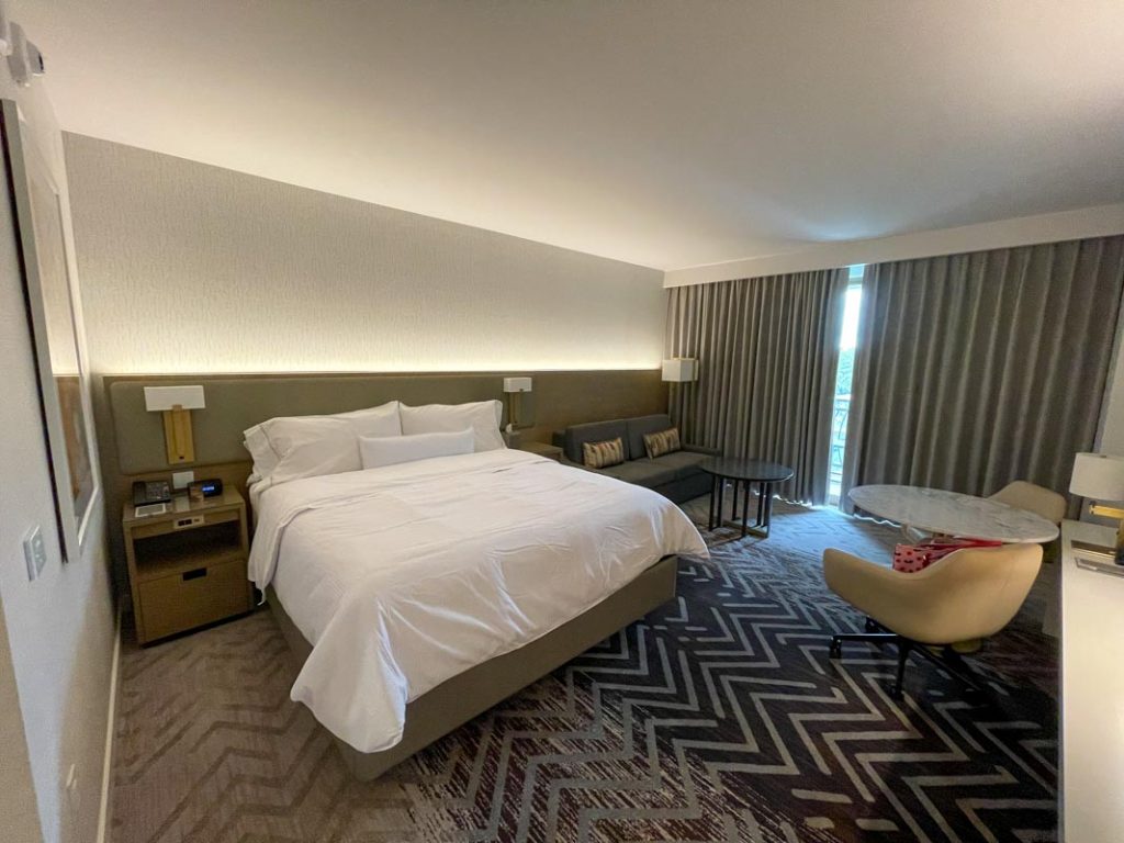 Interior of Westin Anaheim hotel room showing King bed and sofa