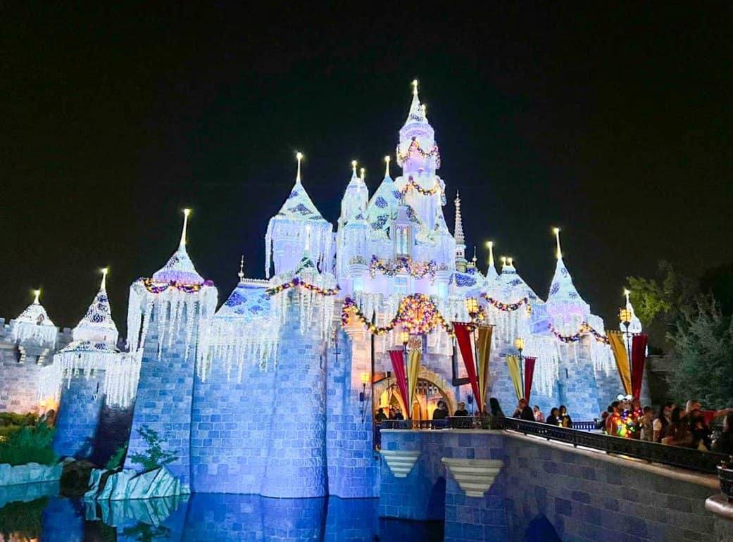 Side view of Sleeping Beauty Winter Castle at night