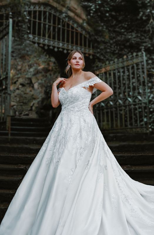 Plus size model wears bridal ballgown inspired by Cinderella