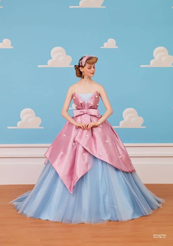 Woman wears pink and blue ballgown inspired by Bo Peep from Toy Story