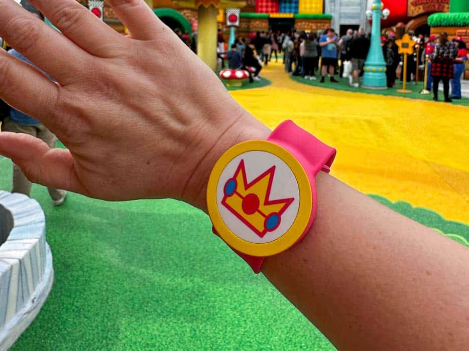 Guest wearing a Power-up Band at Super Nintendo World 