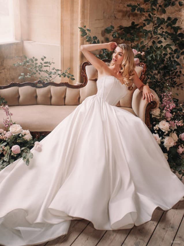 Model wears Aurora inspired wedding dress