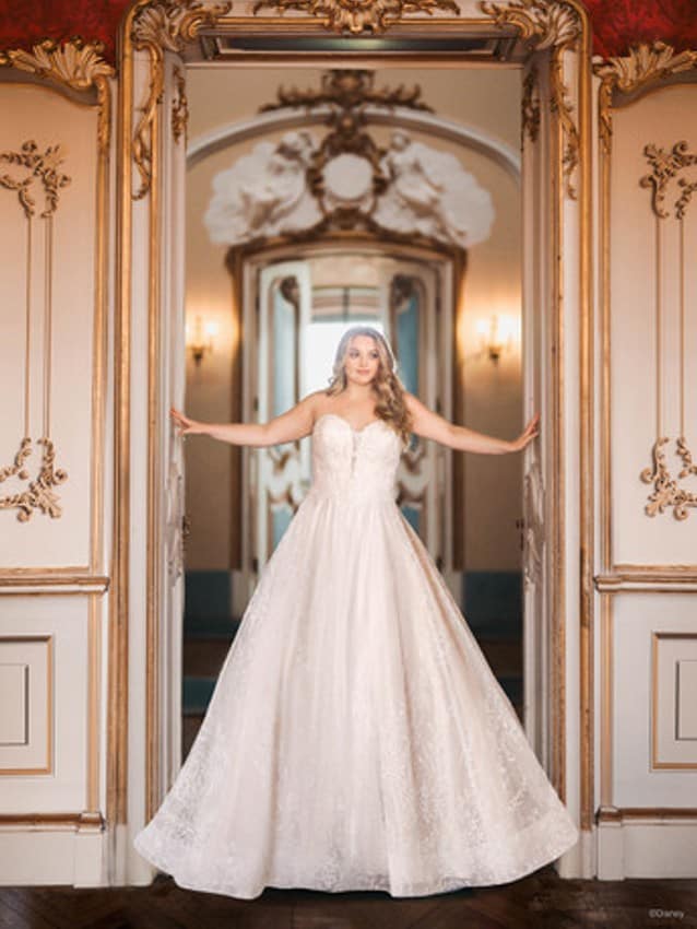 Model wears Cinderella inspired wedding dress