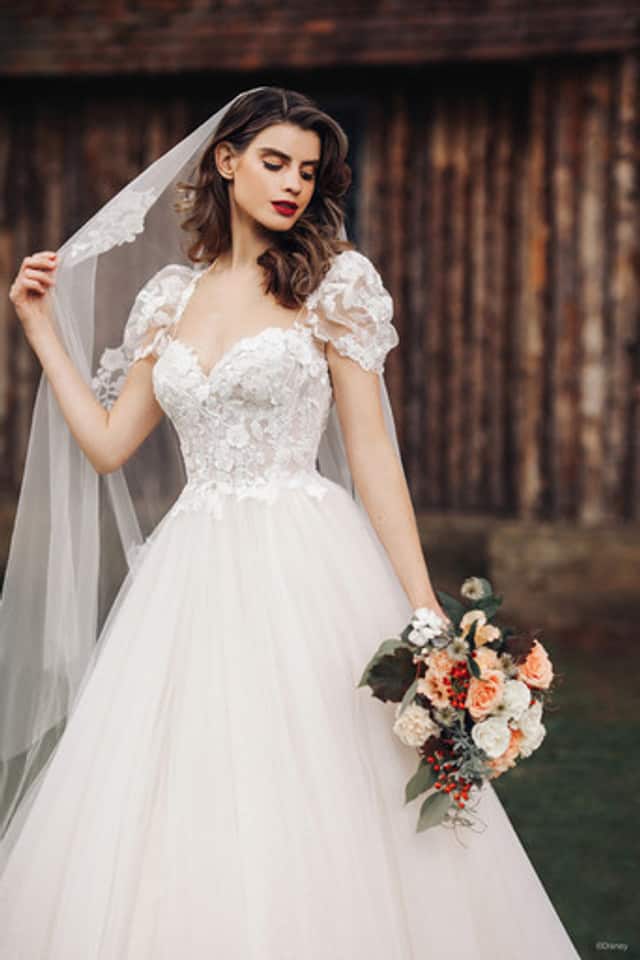 Model wears Snow White inspired wedding dress