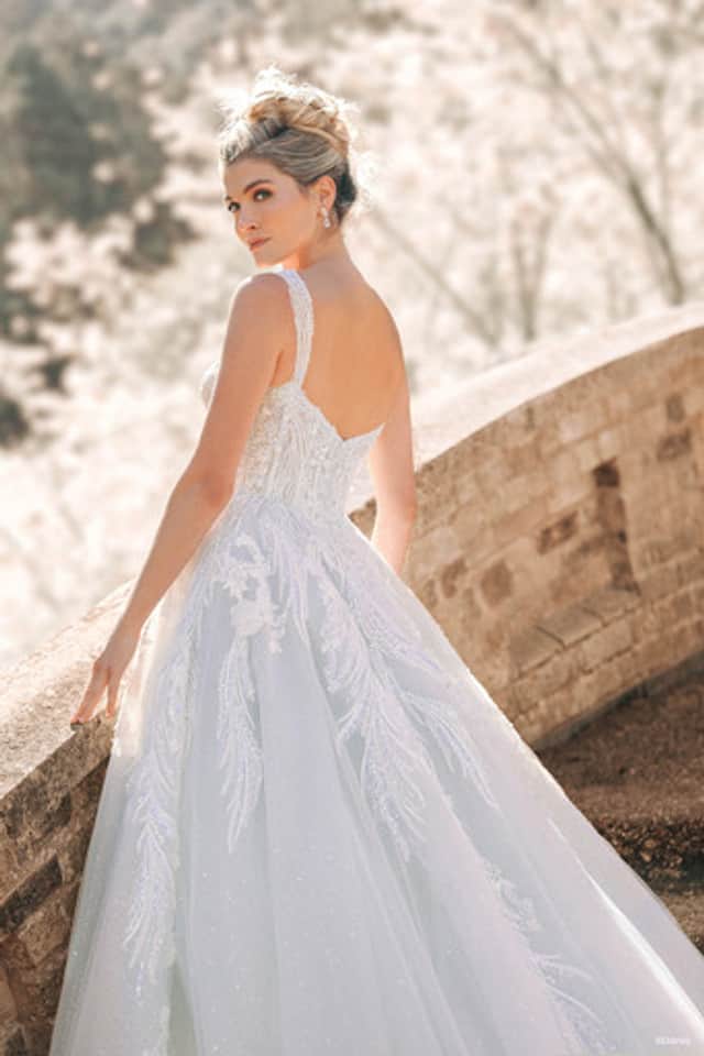 Model wears Cinderella inspired wedding dress