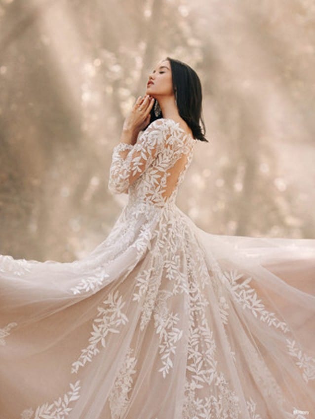 Model wears Pocahontas inspired wedding dress