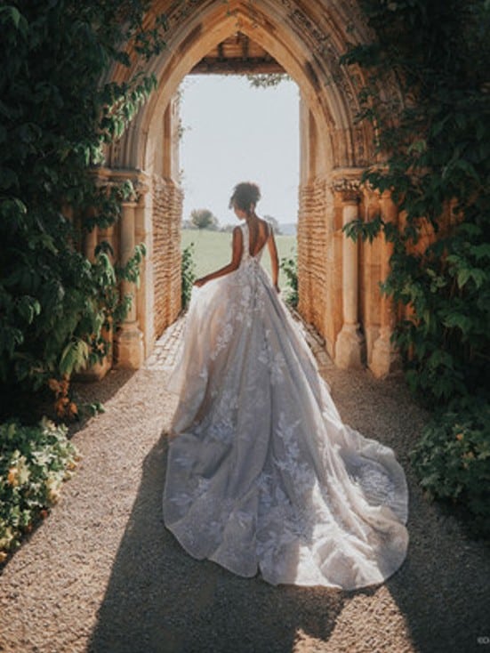 Model wears Tiana inspired wedding dress