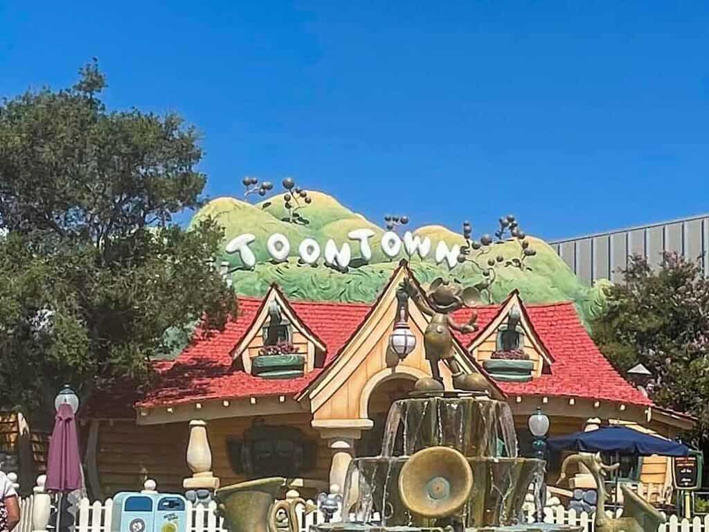 The Toontown sign is shown behind Mickey's house in Toontown at Disneyland