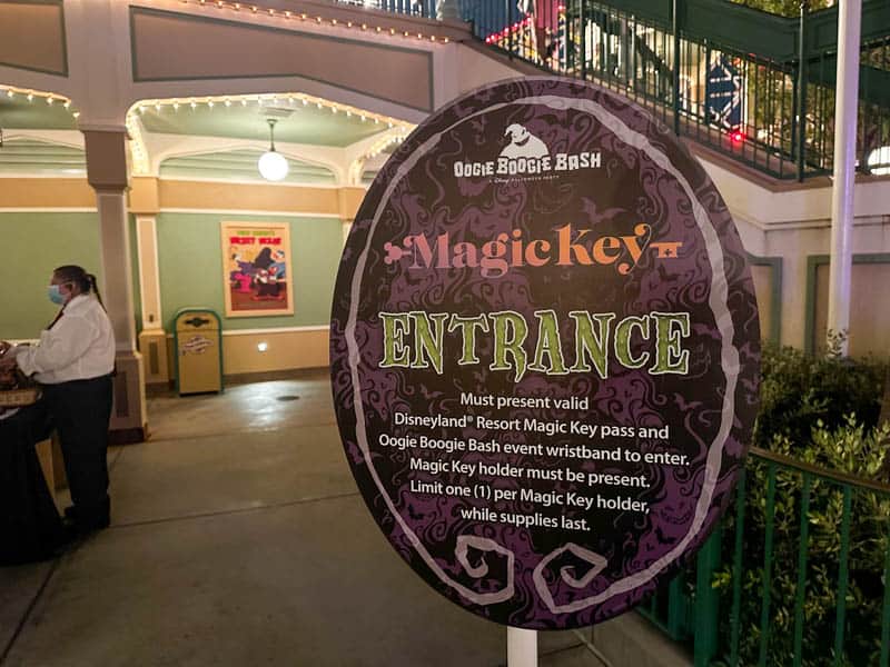 A sign that says Oogie Boogie Bash's magic key entrance.