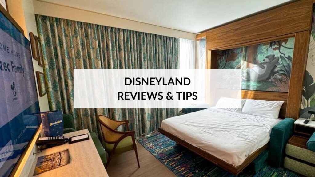 Interior of The Villas at Disneyland Hotel room with text overlay "Disneyland Reviews & Tips"