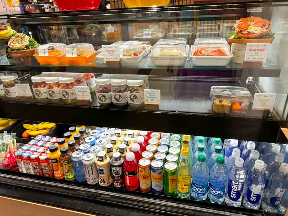 Rows of drinks and chilled items at Sketch Pad Cafe