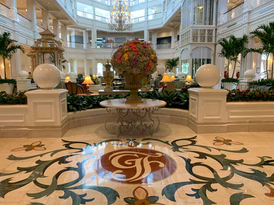 A large vase of flowers in the entry of Grand Floridian Hotel