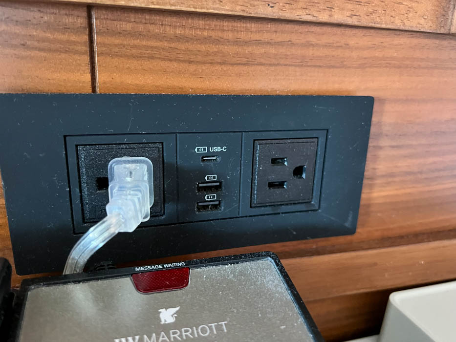 A power outlet with a plug attached to it.