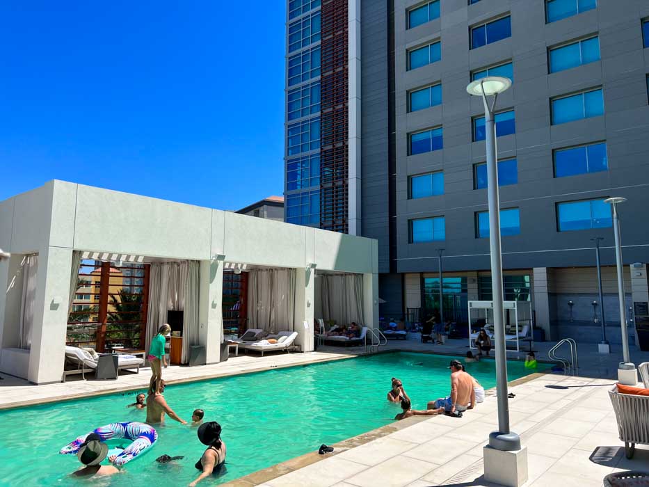 Swimming pool at JW Marriott Anaheim with building exterior in the background